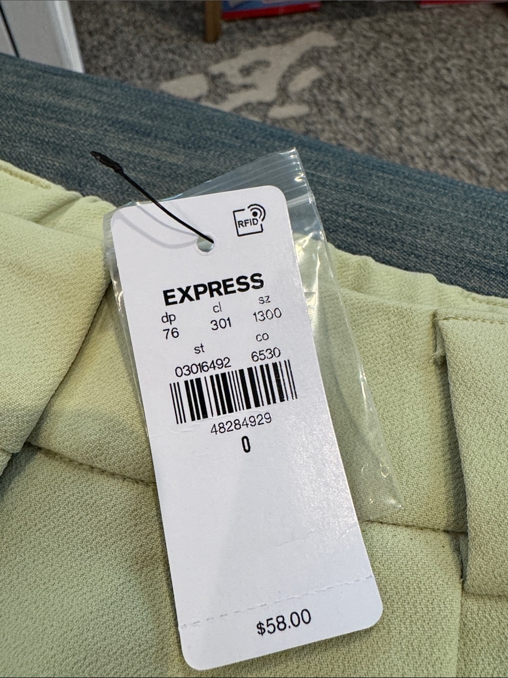 Express High-Rise Pleated Women’s Shorts in Pale Yellow - Picture 2 of 2